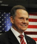 Photo of Moore with US flag in background