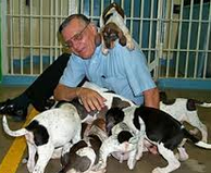 photo of Joe Arpaio with dogs in front of cell door