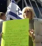 Orly Taitz carrying anti-Obama protest sign