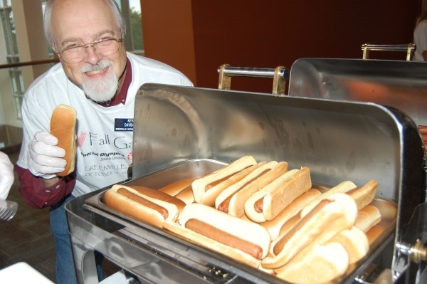 Dr. Conspiracy with a tray of hot dogs